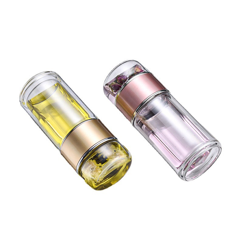 Two tea glass travel mugs with metal accents on a white background