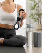 Adjustable resistance feature on an inner thigh trainer