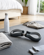 Black adjustable leg trainer with EVA contact pads
