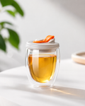 Clear double wall glass coffee tumbler with silicone lid