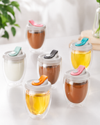 Egg-shaped double wall glass coffee cup with silicone lid