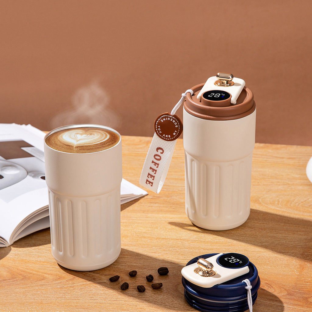 Insulated travel coffee tumbler with temperature display