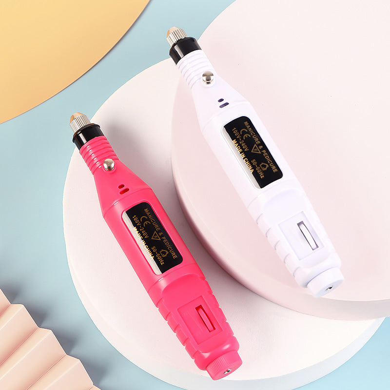 Two electronic devices, one pink and one white, on a light blue and beige background.