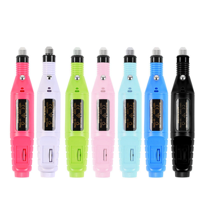 Set of colorful tattoo machines on a white background