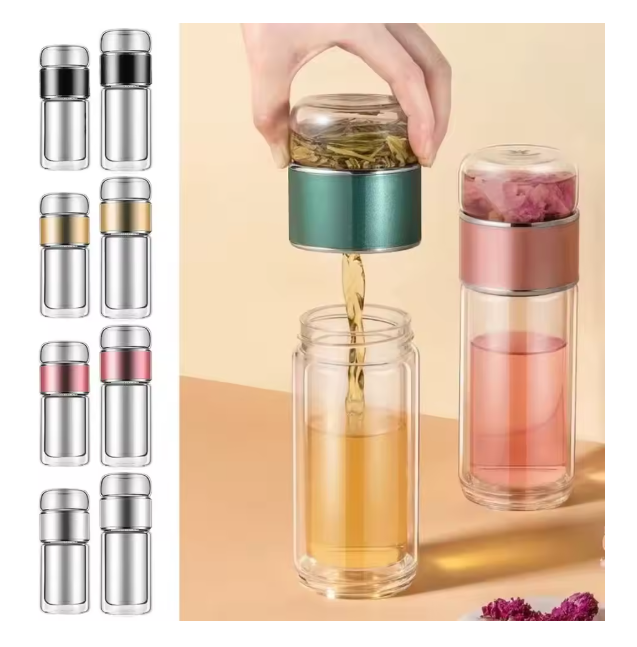 Set of glass tea infusers with different colored lids on a beige background.